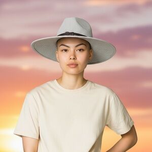 ANTHROPOLOGY ladies, cream colored hat with leather trim NWOT